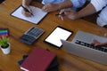 Female secretary sitting next to boss taking down note in office Concept of business routine - Image Royalty Free Stock Photo