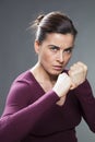 Female self-defense concept for woman countering violence