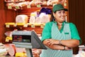Female seller in supermarket shop Royalty Free Stock Photo