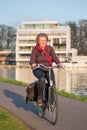 Female senior cycling at Nieuwe Kaai, Turnhout, Belgium