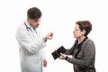 Female senior patient showing empty wallet to male doctor Royalty Free Stock Photo