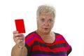 Female senior shows red card