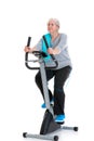 Female senior train with fitness machine