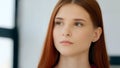 Female serious female 20s portrait indoor alone sad calm confident caucasian european appearance redhead woman student