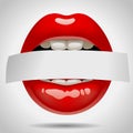 Female gloss red lips with a paper ribbon in the teeth