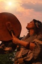 Female shaman performs a ritual with a tambourine