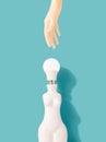 Female shaped vase with light bulb instead of a head with hand reaching. Royalty Free Stock Photo