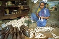 Female shoemaker at work in workshop in Dhaka