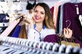 Female shopper boasting her purchases in underwear shop Royalty Free Stock Photo