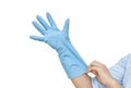 Female shoulder putting on sterile gloves. Hand woman wearing gloves on white background Royalty Free Stock Photo