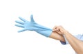 Female shoulder putting on sterile gloves. Hand woman wearing gloves on white background Royalty Free Stock Photo