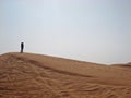 Female Silhouette on Sand Dune