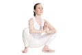 Female sitting in yoga squat Royalty Free Stock Photo