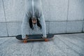 Skateboarder doing a handstand on skateboard Royalty Free Stock Photo