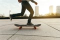 Female skateboarder riding with skateboard