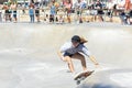 Female skateboarder shredding the course.