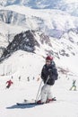 Female skier enjoy in beautiful snowy alps mountain range scenic Royalty Free Stock Photo