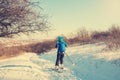 Female skier skiing downhill. Back view. Royalty Free Stock Photo