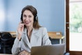 Female smiling wear headset operator worker call center hotline. woman working customer support service operator. communication in Royalty Free Stock Photo