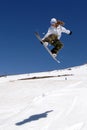 Female snowboarder jump shadow Royalty Free Stock Photo