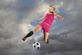 Female Soccer Player Kicking a Ball