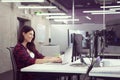 Female software developer using laptop computer