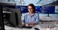 Female Software Engineer Typing Code On Computer At Office Desk Royalty Free Stock Photo