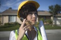 Female Solar Panel Worker With Blue Print Wearing Headset Royalty Free Stock Photo