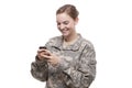 Female soldier text messaging Royalty Free Stock Photo