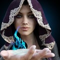 Female sorcerer with blue magic coming from her hand