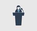 Female Speaker icon on gray background.