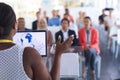 Female speaker speaks in a business seminar