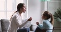 Female speech therapist teaching preschool kid girl learning articulation
