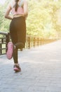 Female sport fitness runner jogging outdoors on bridge in spring Royalty Free Stock Photo