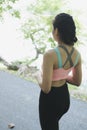 Female sport fitness runner jogging outdoors in spring or summer Royalty Free Stock Photo