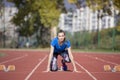Female Sprinter Getting Ready to Start The Race Royalty Free Stock Photo