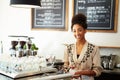 Female Staff In Coffee Shop