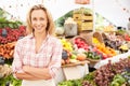 Female Stall Holder At Farmers Fresh Food Market Royalty Free Stock Photo