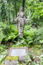 Female statue as tombstone at St Michael`s cemetery, Riga,Latvia