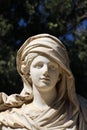 Female statue in a garden Royalty Free Stock Photo