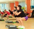 Female on the step board during exercise Royalty Free Stock Photo