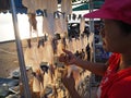 ÃÂ Female Street Vendor Were Selling Sun Dried Squid Grill