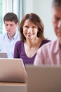 Female Student In Adult Education Computer Class