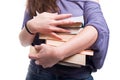 Female student carrying a pile of books Royalty Free Stock Photo