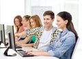 Female student with classmates in computer class Royalty Free Stock Photo