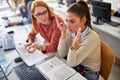 A female student frustrated about a new lesson. Smart young people study at the college. Education, college, university, learning Royalty Free Stock Photo