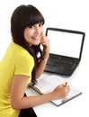 Female student with a laptop and notebook Royalty Free Stock Photo