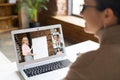 Back view on laptop screen, a businesswoman using laptop for video call