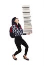 Female student lifting many books Royalty Free Stock Photo