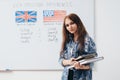 Female student looking at camera. English language school. Royalty Free Stock Photo